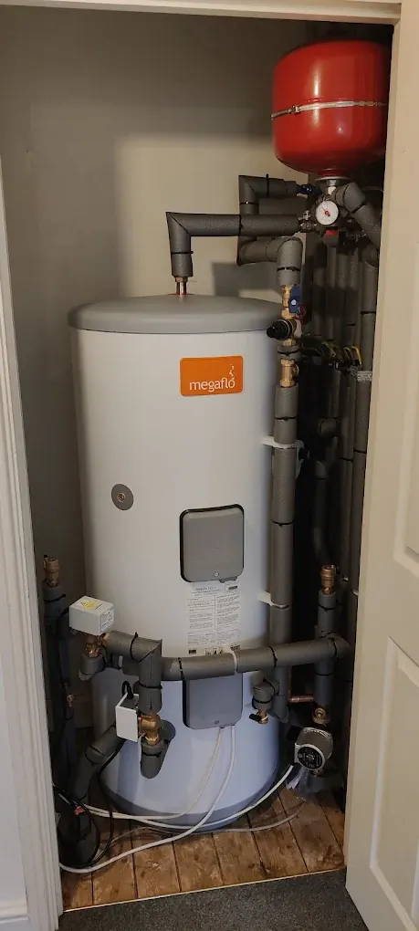 Megaflo unvented cylinder with its expansion vessel, valves and insulated pipework